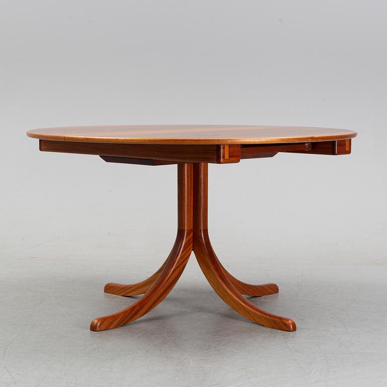 A model 771 mahogany dining table by Josef Frank for Firma Svenskt Tenn.