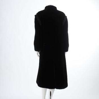 SONIA RYKIEL, a faux fur black coat.