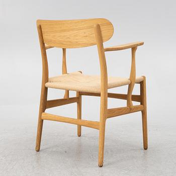 Hans J. Wegner, a CH26 chair, Carl Hansen & Son, Denmark, 21st century.