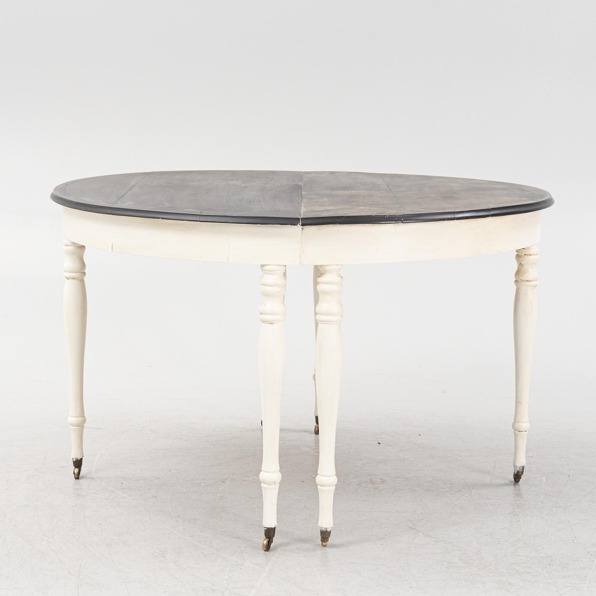 A painted dining table, late 19th Century.