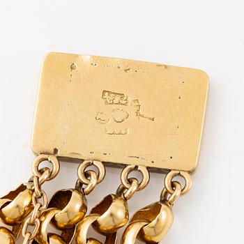 A bracelet in 18K gold, 19th century.