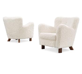 A pair of Fritz Hansen 'Model 1669' armchairs, Denmark.