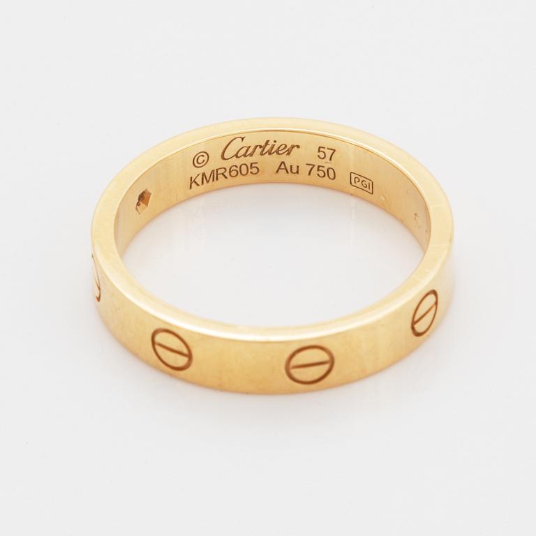 Cartier ring "Love" 18K guld med en rund briljantslipad diamant.