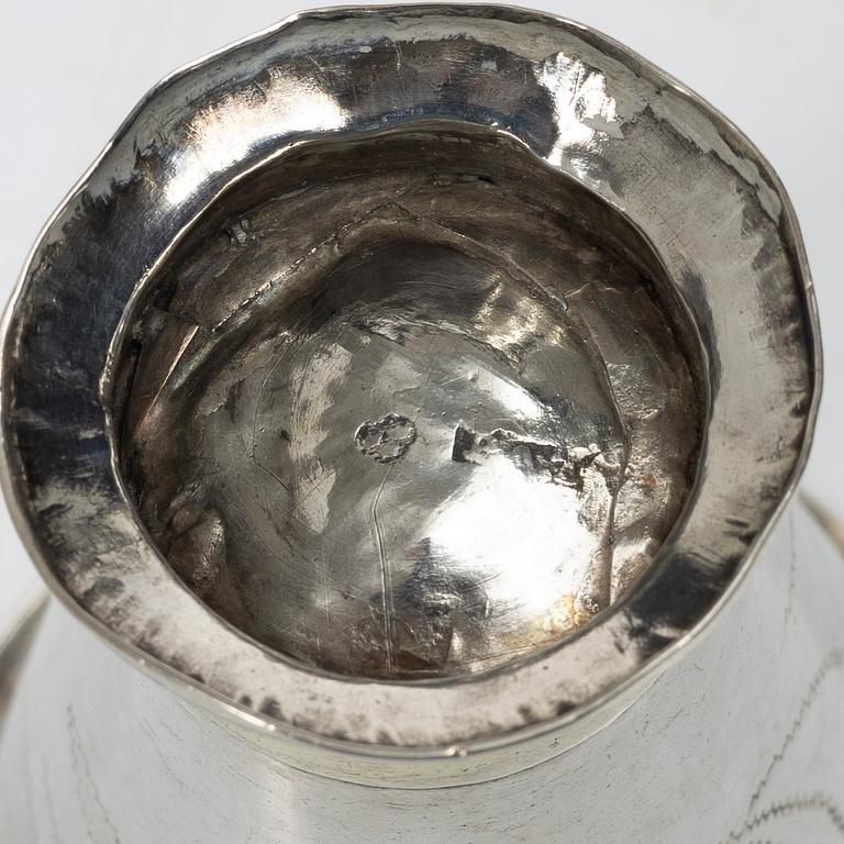 A Swedish silver cup and two beakers.