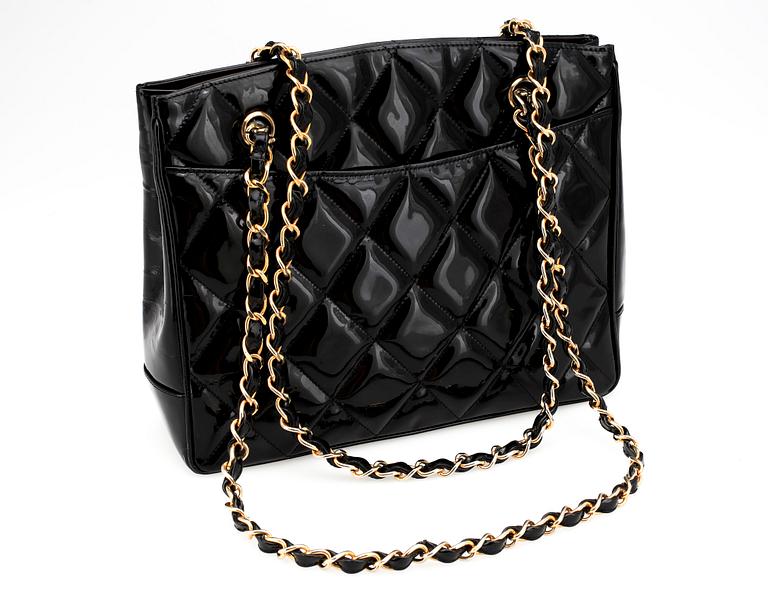 CHANEL, a black quilt leather shoulder bag, 1980's.