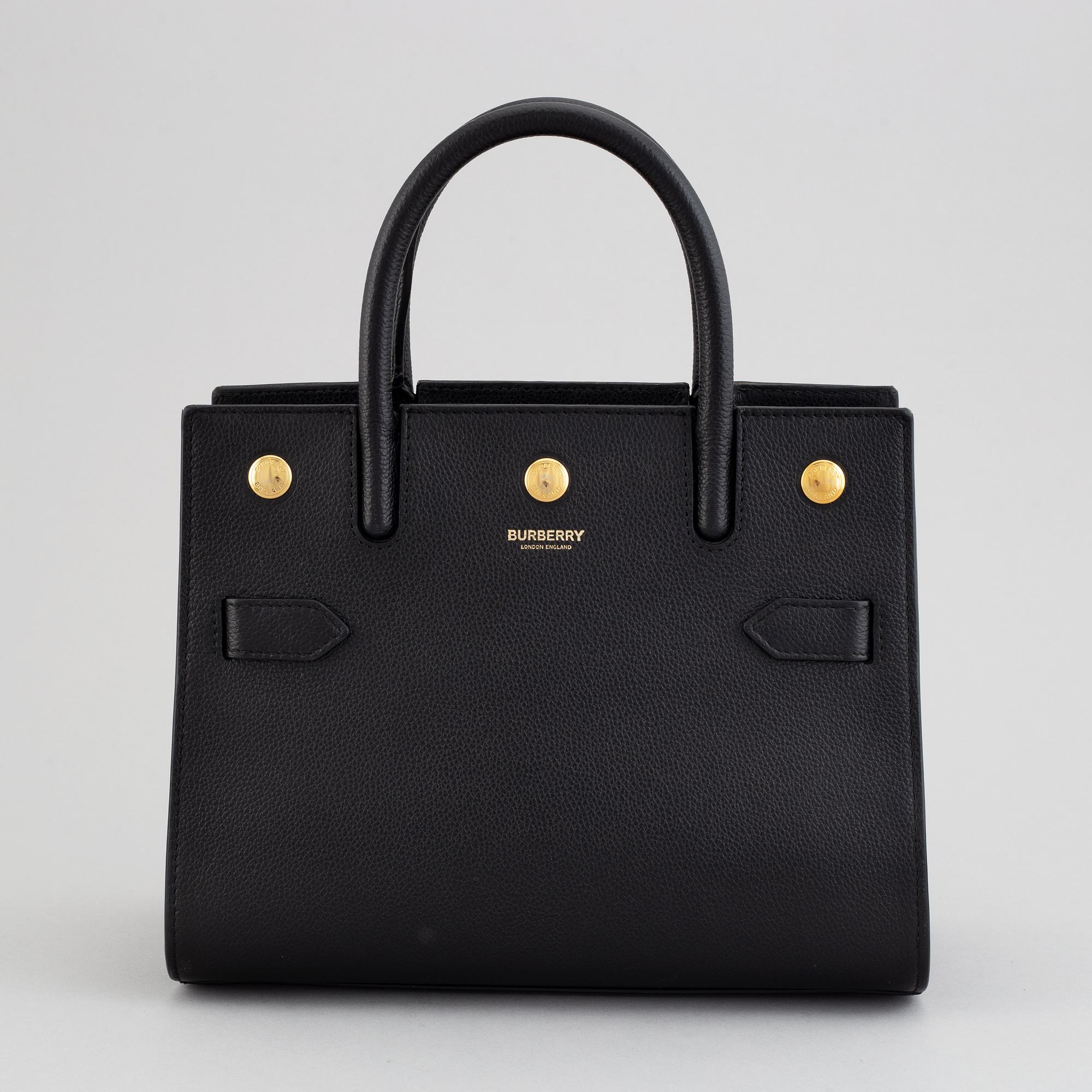 Burberry, a black leather 'Baby Title' handbag, 2019.