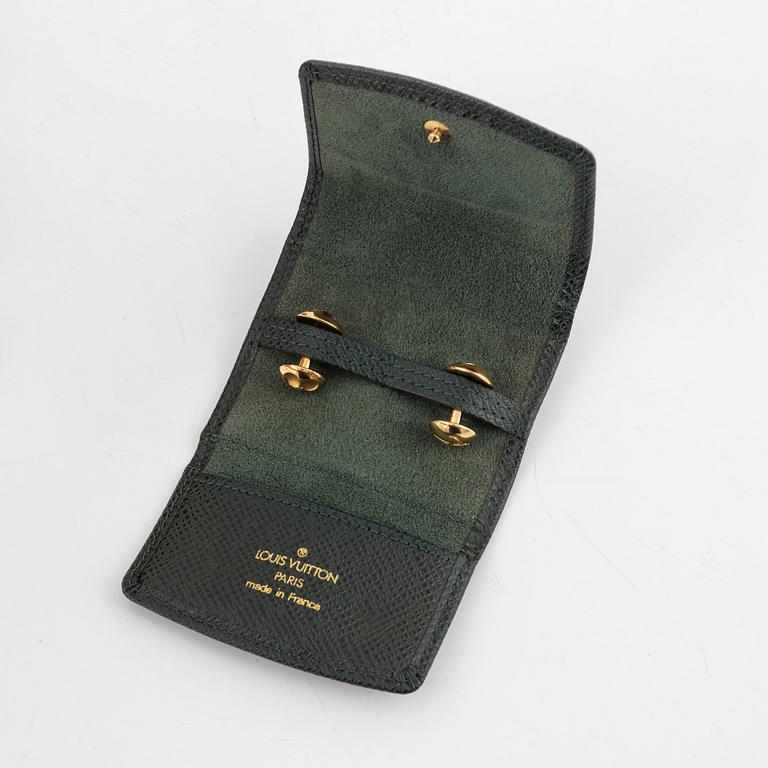 Louis Vuitton, a pair of cufflinks in a taiga case.