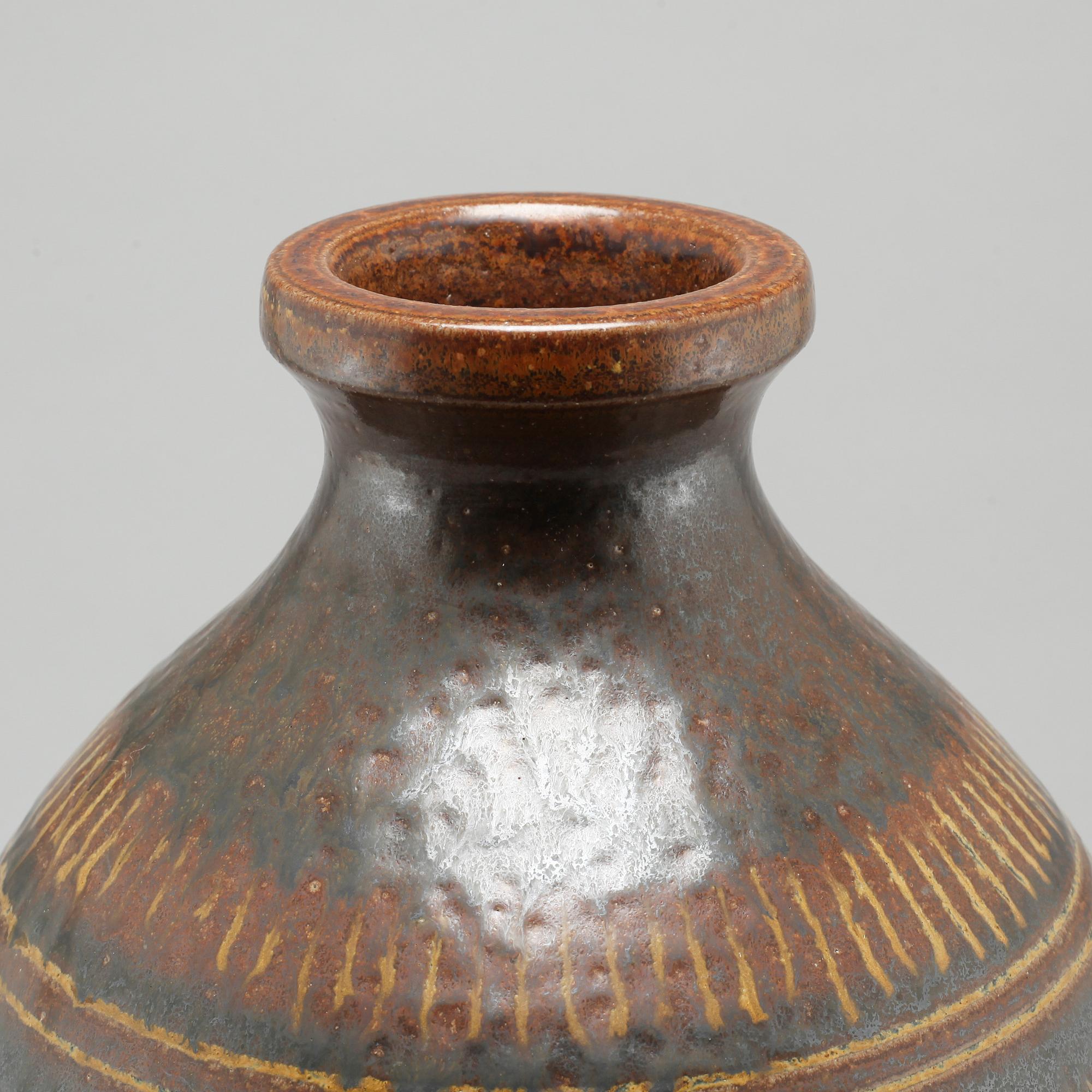 A mid 20th century floor vase in stoneware by by Arthur Andersson fr Wallåkra Lerkärlsfabrik.