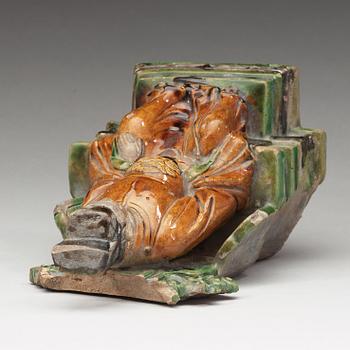 A ceramic sculpture of a seated daoist dignitary, Ming dynasty, (1368-1644).