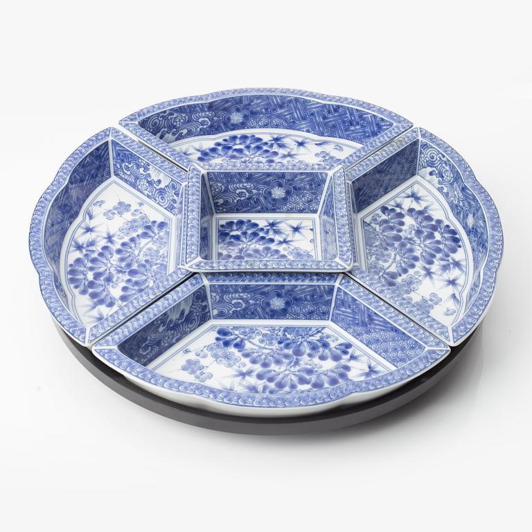 A Japanese blue and white six piece cabaret on a 'lazy Susy', secon half of the 20th century.