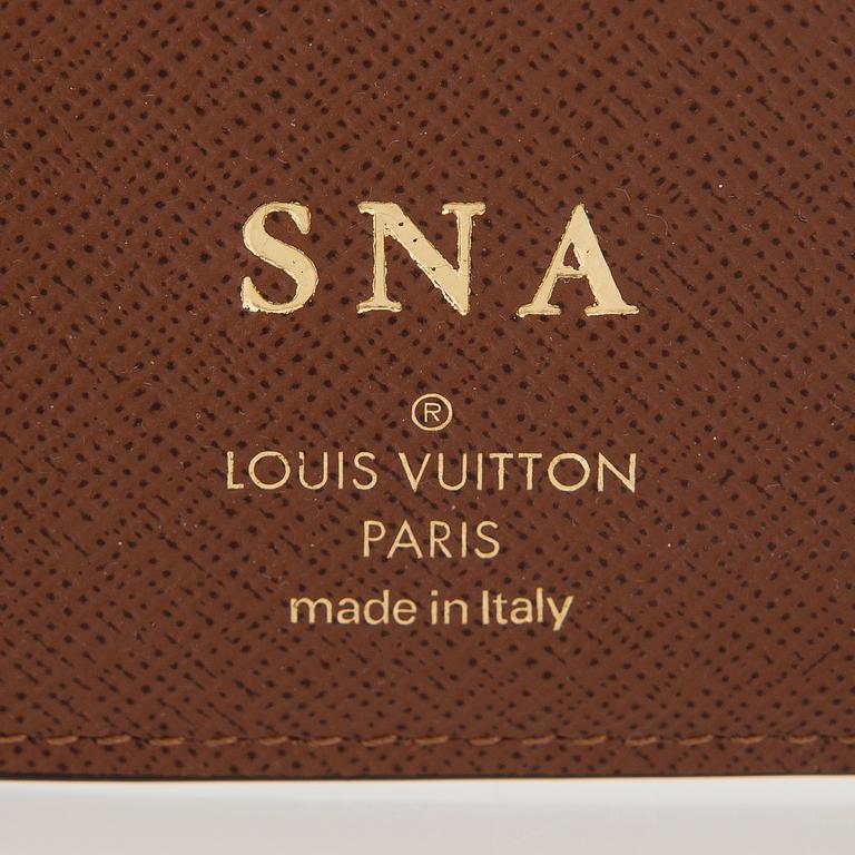 Louis Vuitton, "Victorine" lompakko sekä 6 avaimen avainkotelo.