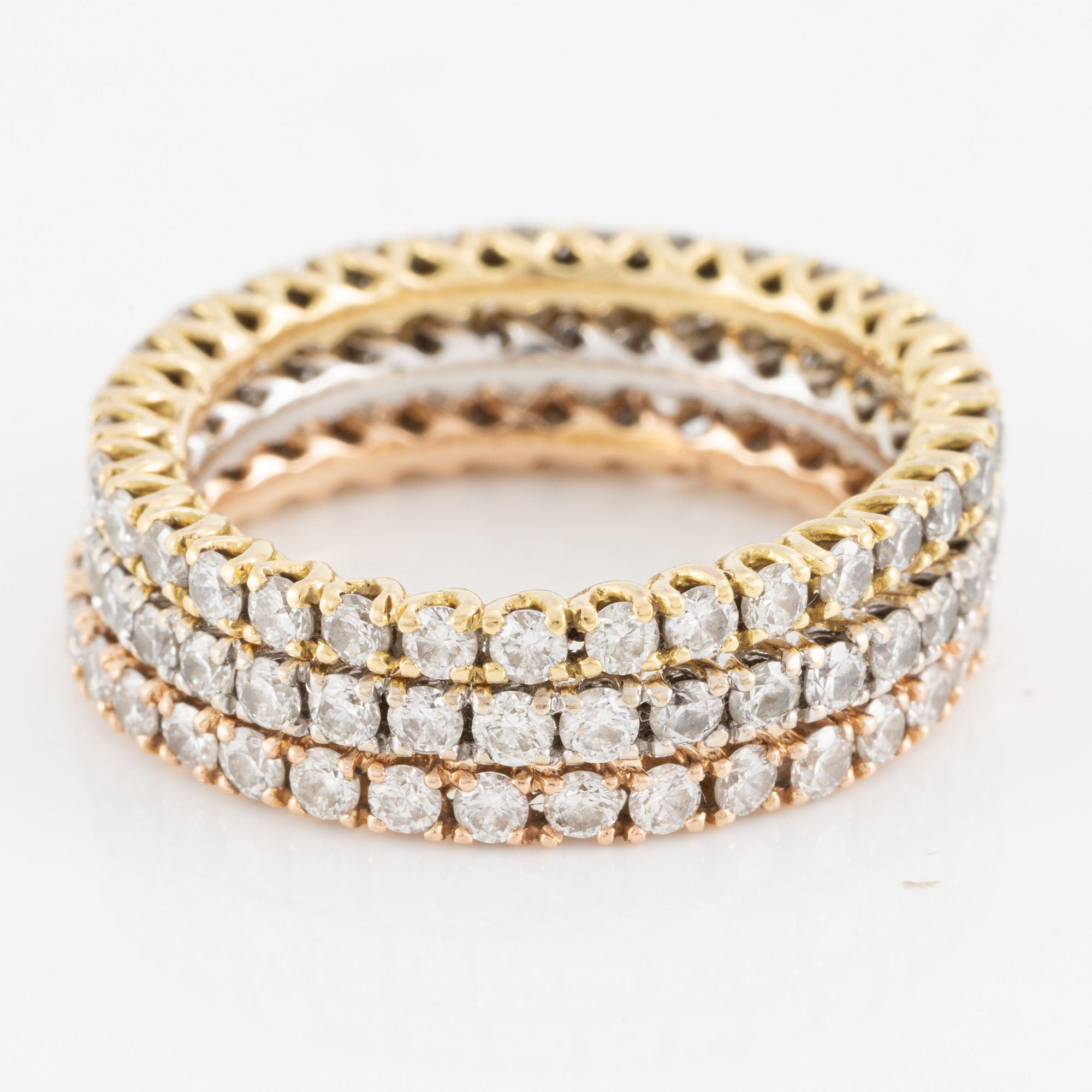 Rings, three pieces, set with brilliant-cut diamonds.