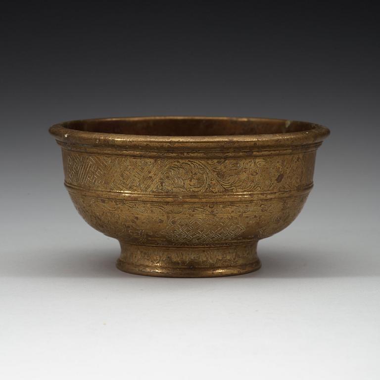 A Tibetan bronze bowl, 19th Century.