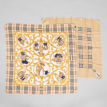 Burberry, a set of two silk scarves.