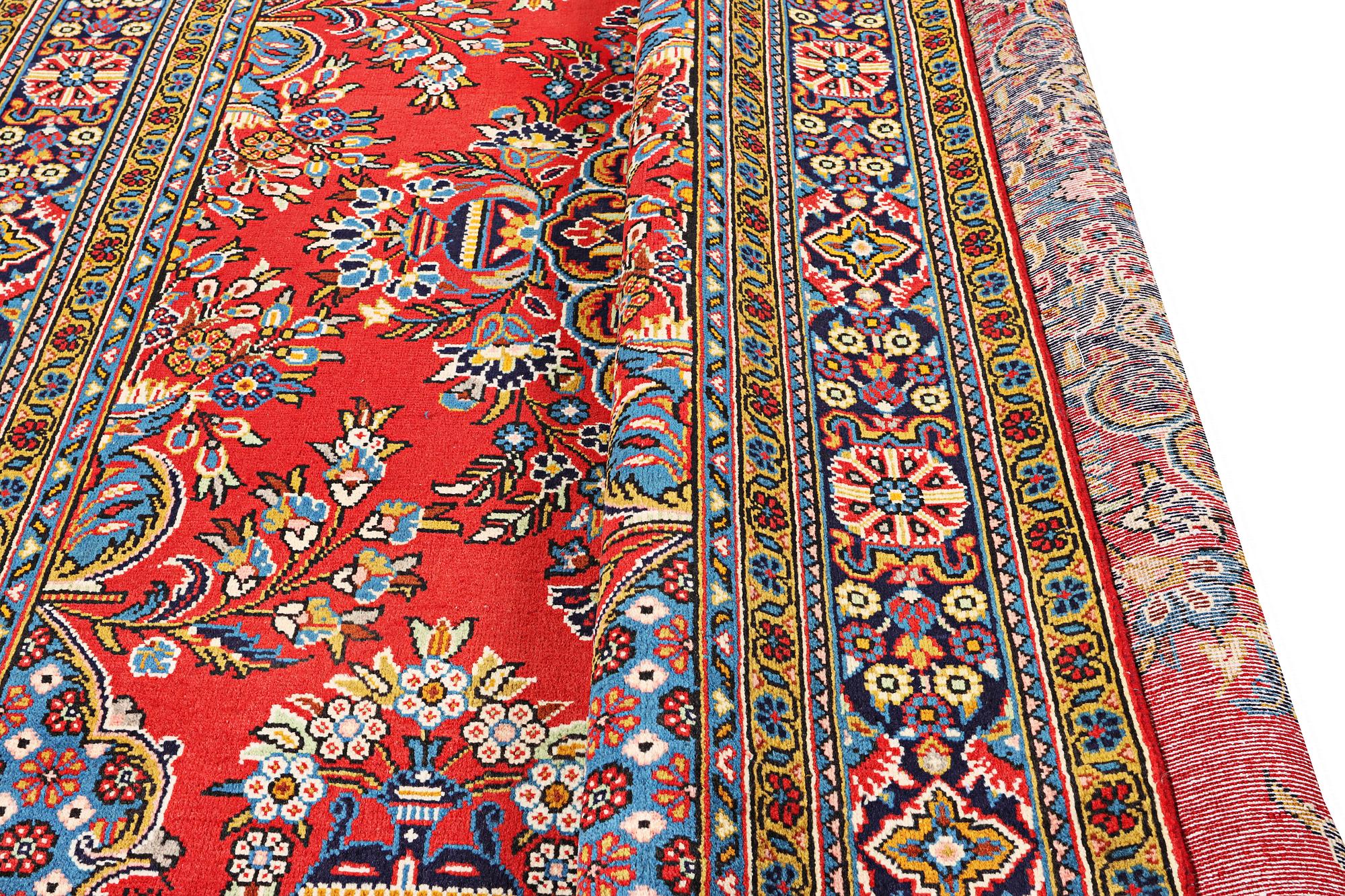 A Golpaygan carpet, c. 320 x 210 cm.