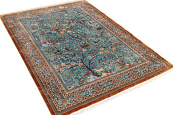 An all silk oriental carpet, a. 280 x 185 cm.