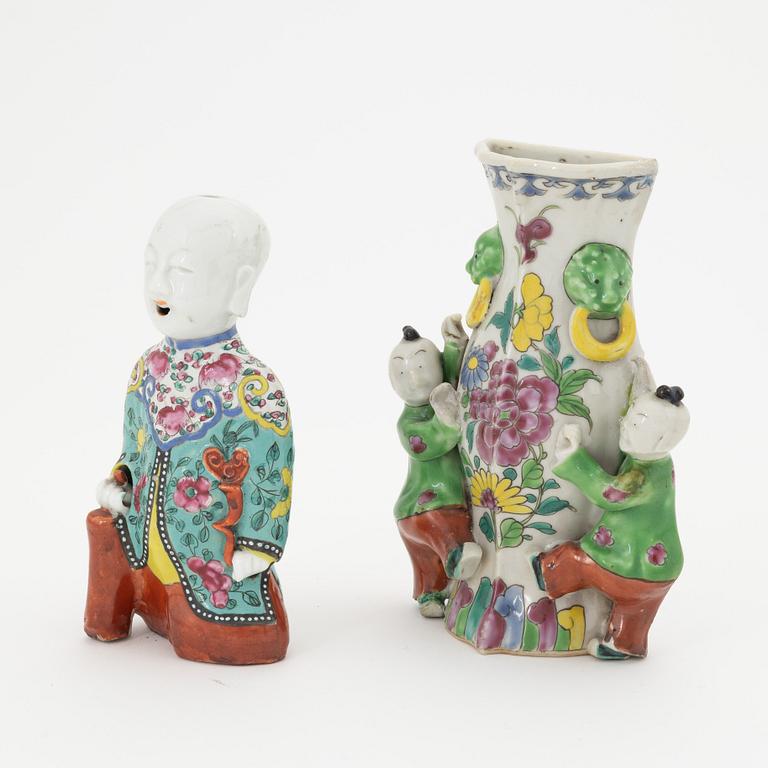 A famille rose porcelain figure and a wall vase, Qing dynasty, 19th Century.