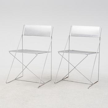 A set of six 'X-line' chairs by Niels Jorgen Haugesen for Magis, designed 1977.