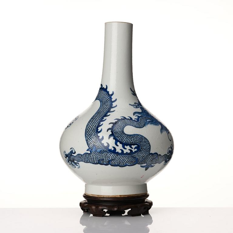 A blue and white dragon vase, Qing dynasty with Xuande six character mark.