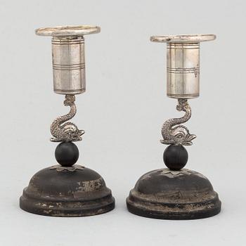 A pair of Empire candle sticks by Carl Gustaf Lundgren, Österstund (1867-1869).