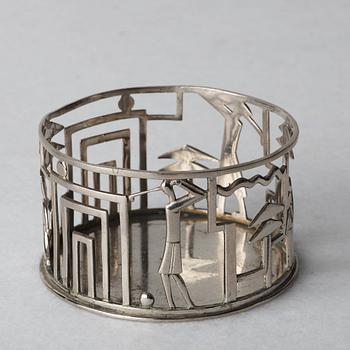 Werkstätte Hagenauer, a white metal coaster, Vienna.