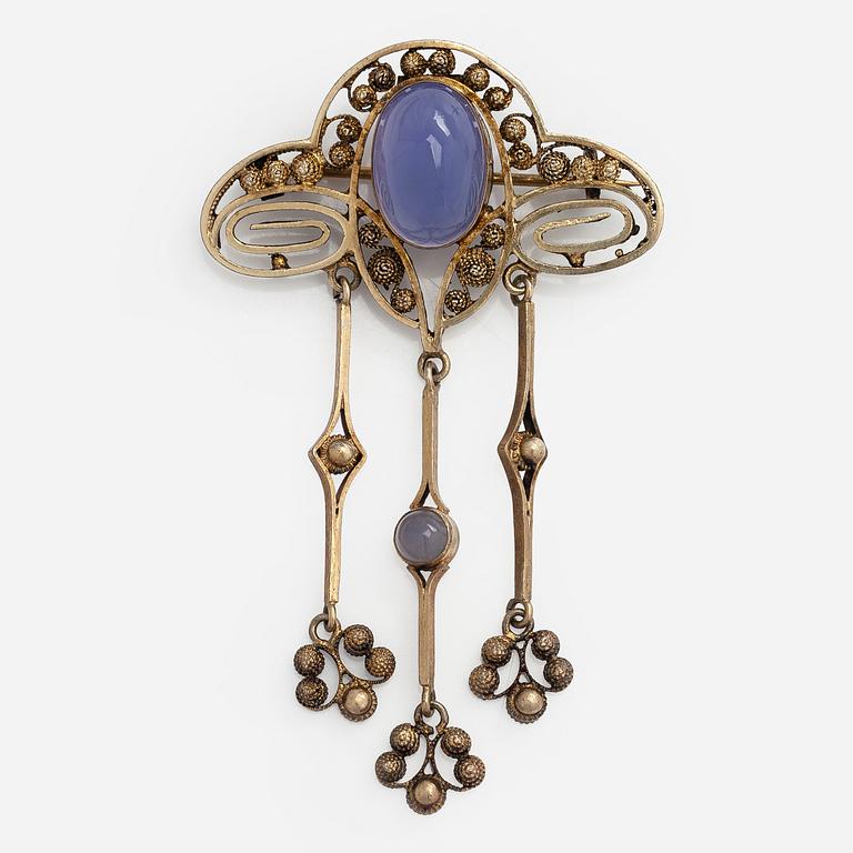 Brooch, cabochon-cut moonstones, gilded silver.