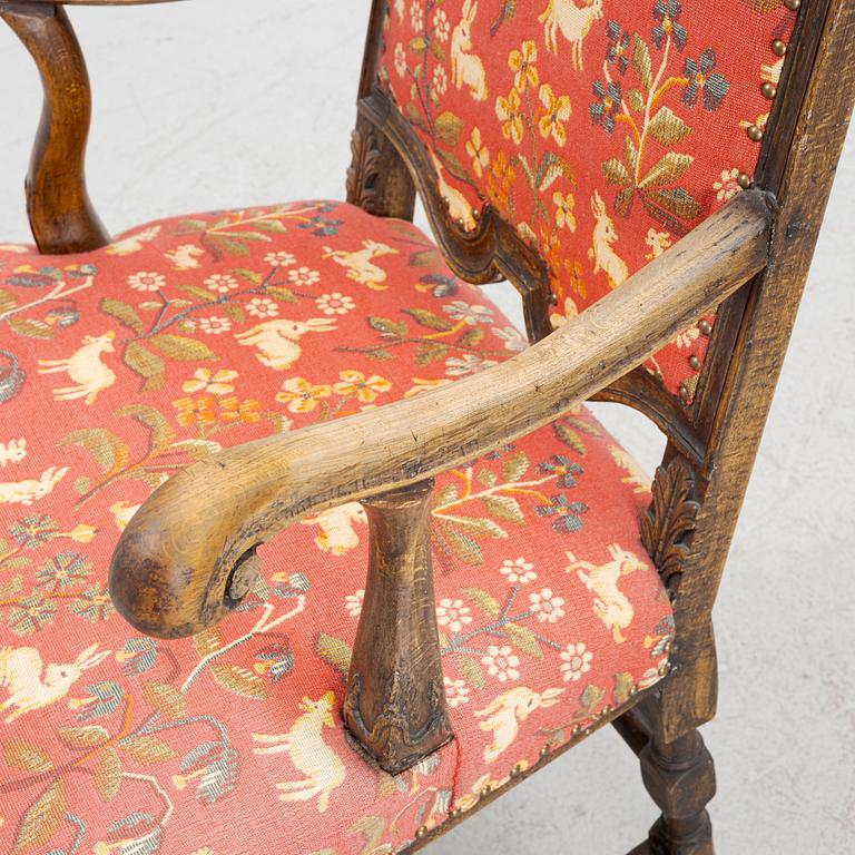 An oak baroque armchair from around the year 1700.