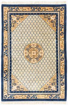A carpet, China, antique finish, ca 275 x 185 cm.
