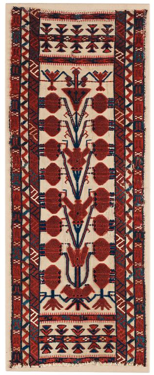 A TENT BAND, FRAGMENT, an antique Turkmen, Czar Russia, ca 102,5 x 39 cm. Framed (with the mounting 107x42 cm).