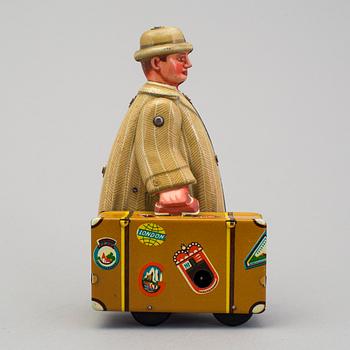 A tinplate Fritz Voith man with suitcase, Germany, 1950s.