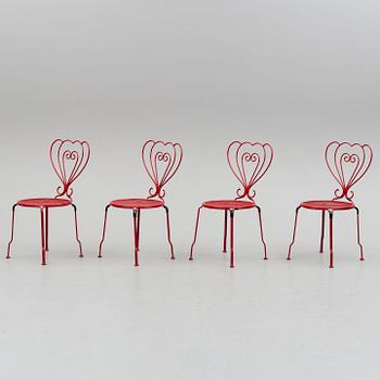GARDEN FURNITURE, a table and four chairs, late 20th century.
