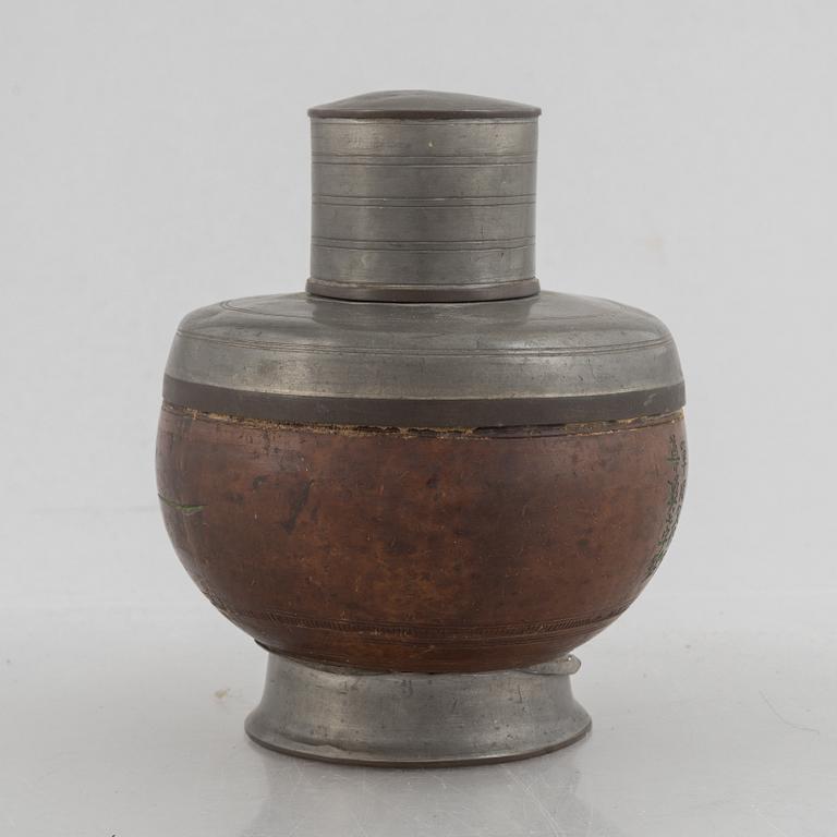A Chinese pewter and wood tea caddie, early 20th century.