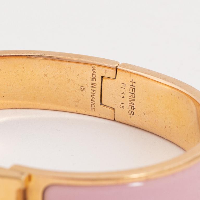 Hermès, a 'Clic H PM' bracelet.
