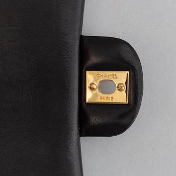 Chanel, a black, quilted leather 'Double Flap' bag, 2011.