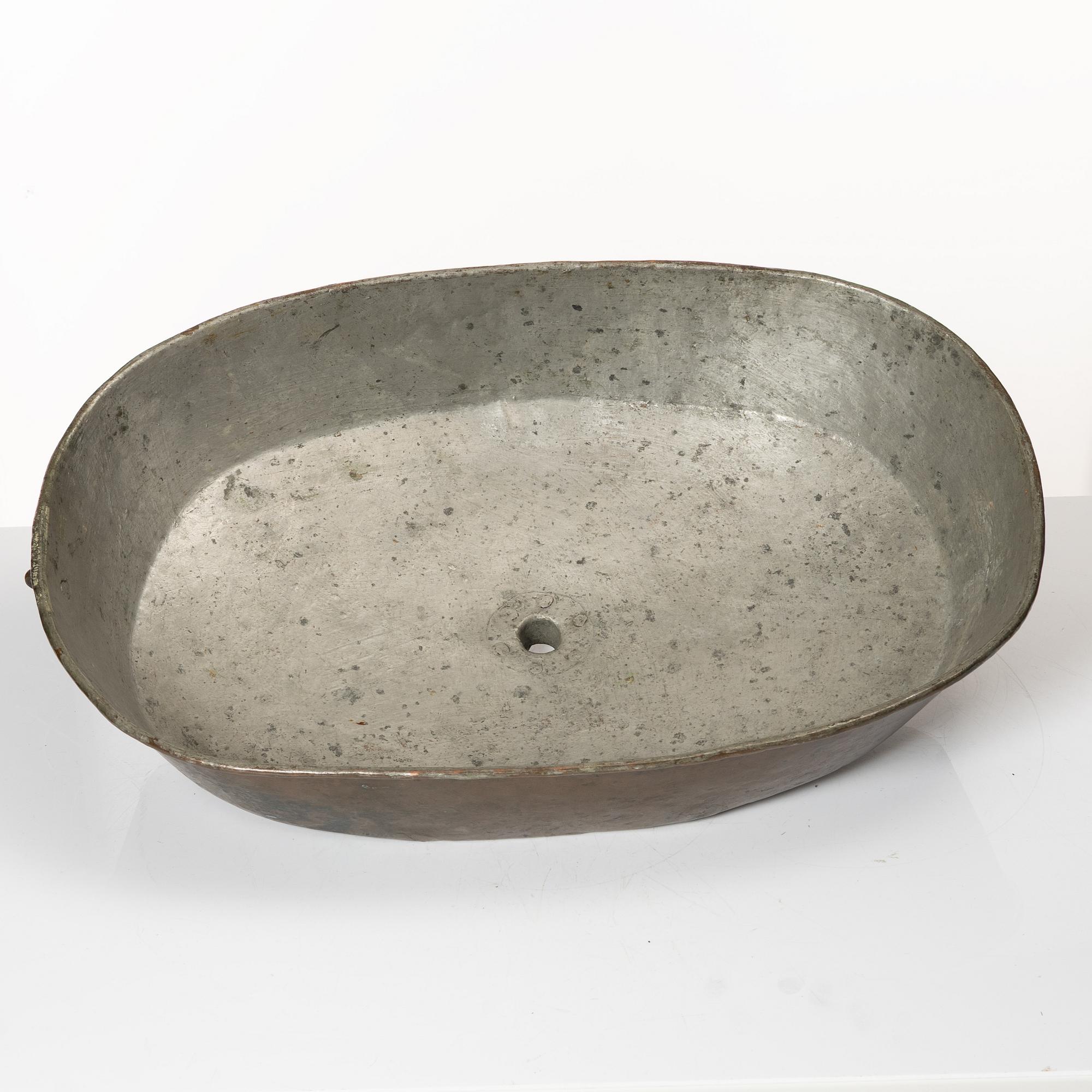 A Swedish copper funnel, 18th / early 19th century.