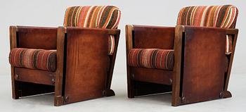 A pair of Axel Einar Hjorth brown leather 'Funkis' armchairs, Nordiska Kompaniet, Sweden ca 1930.