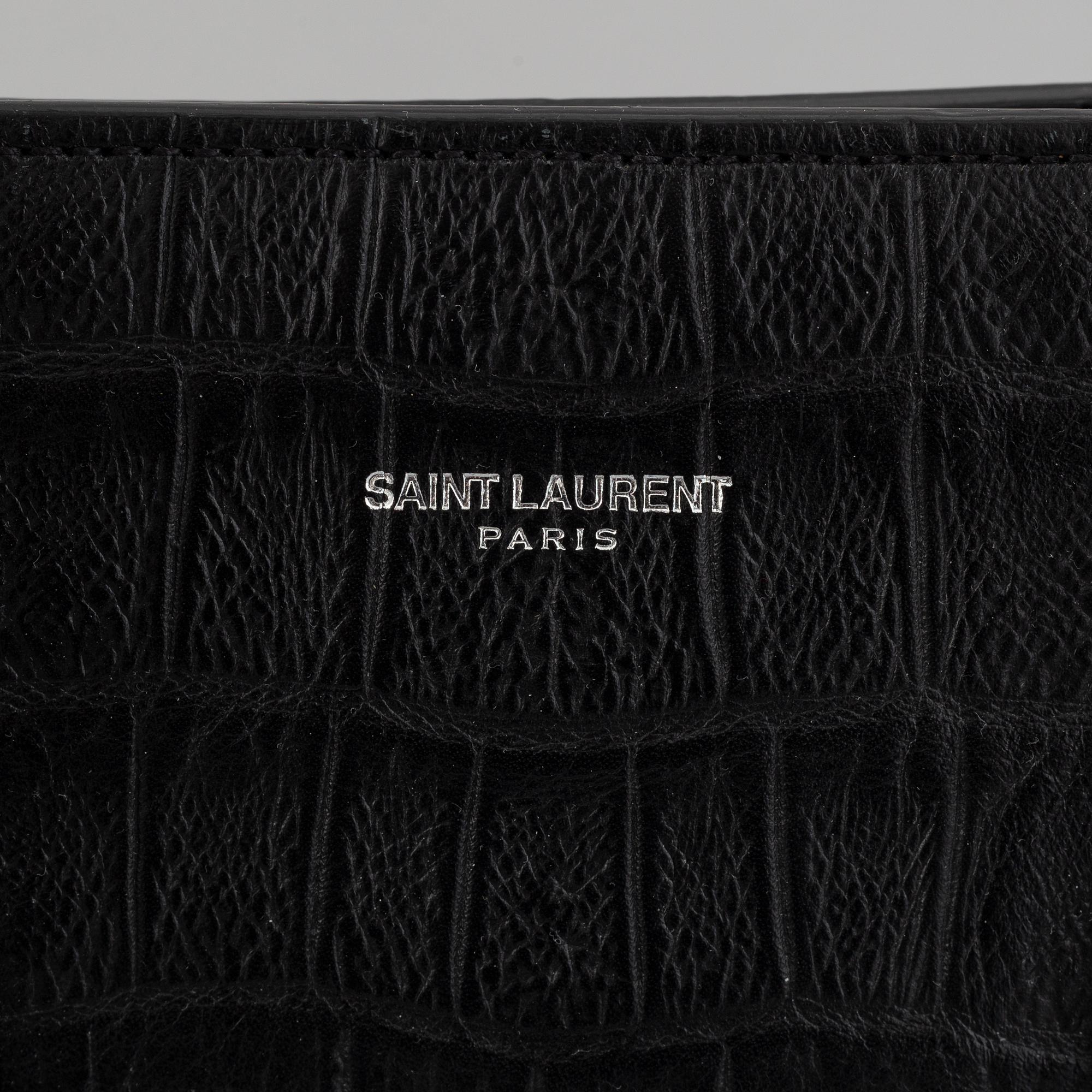 Yves Saint Laurent, a crocodile embossed 'Sac de Jour' leather handbag.