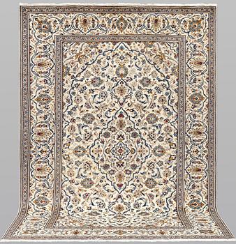 A Keshan carpet, approx. 306 x 193 cm.