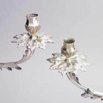 A pair of German 18th century silver candelabras, mark of C.C. Papcke, Stralsund.