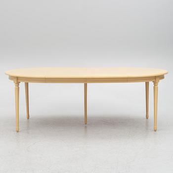 A Gustavian style dining table with six dining chairs, Sweden, 21st century.