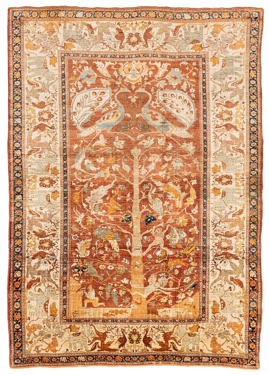 An antique silk Tabriz carpet, north west Persia, c 239 × 168 cm.