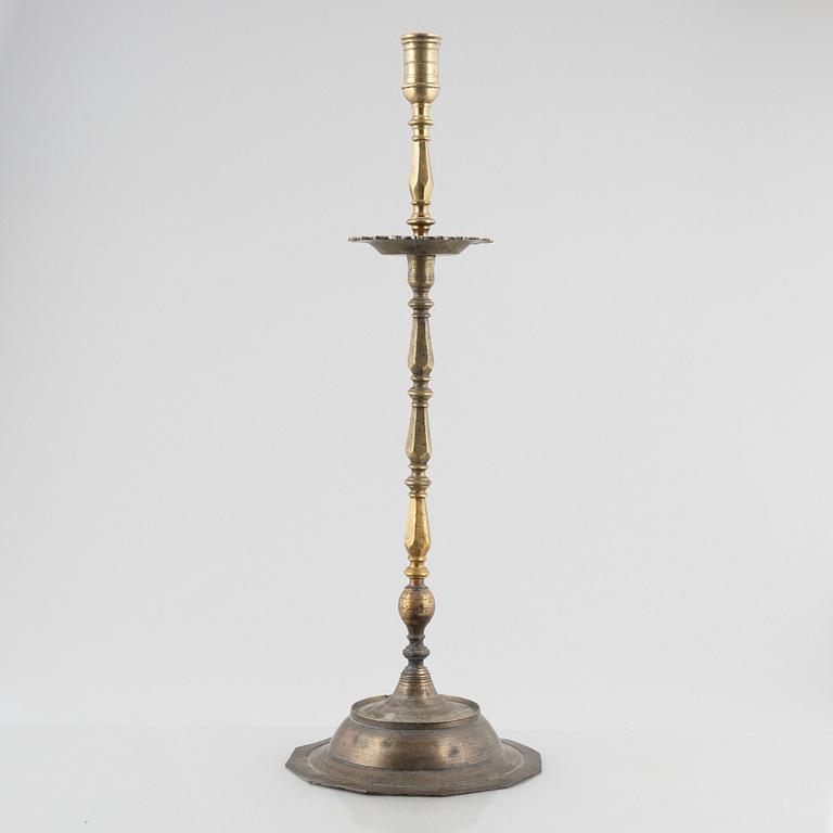A Baroque-style floor candle stick, around 1900.