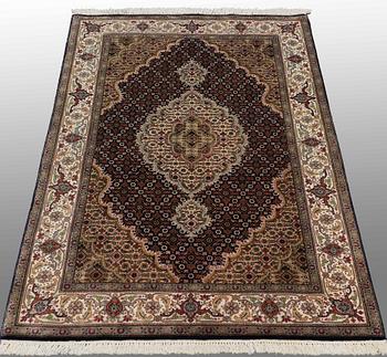 A RUG, Oriental, part silk, around 155 x 103 cm.