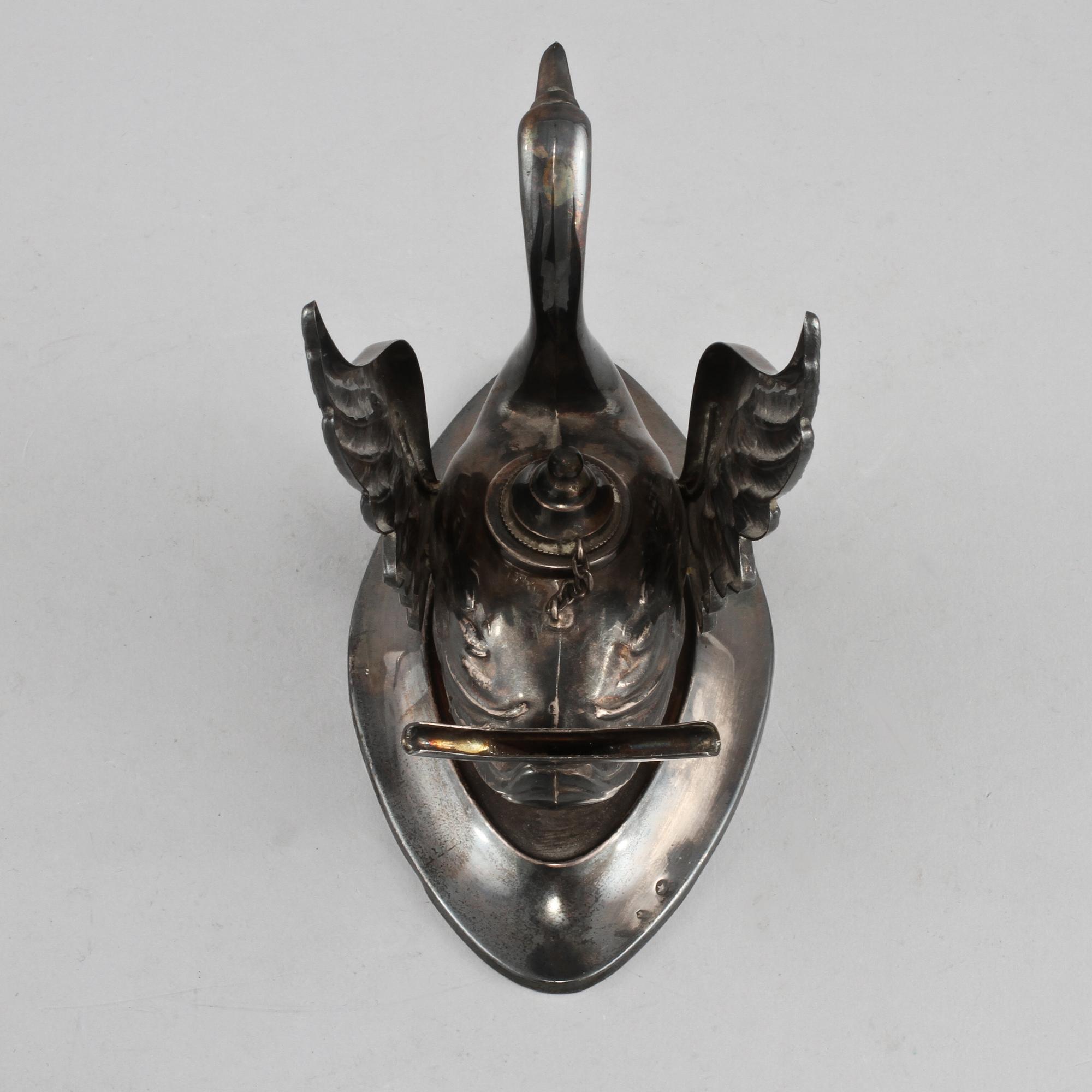 KONJAKSVÄRMARE, silver, troligtvis Spanien, 1900-talets första hälft. Vikt (exklusive glas) 130 g.