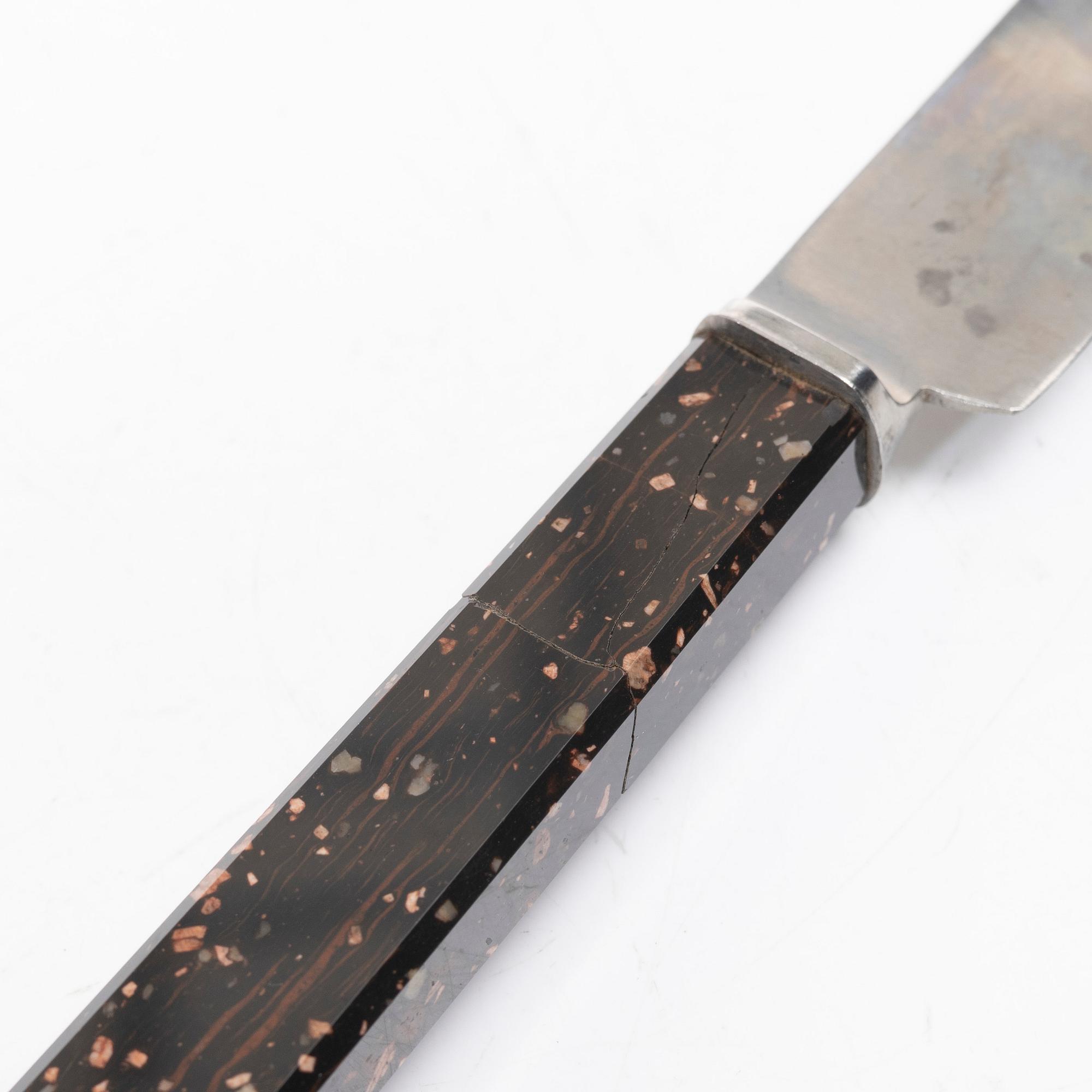 Six 19th century table knives with porphyry handles, Sweden.