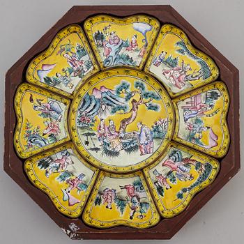 A nine piece enamel on coppar  cabaret in a wooden box, Qing dynasty.