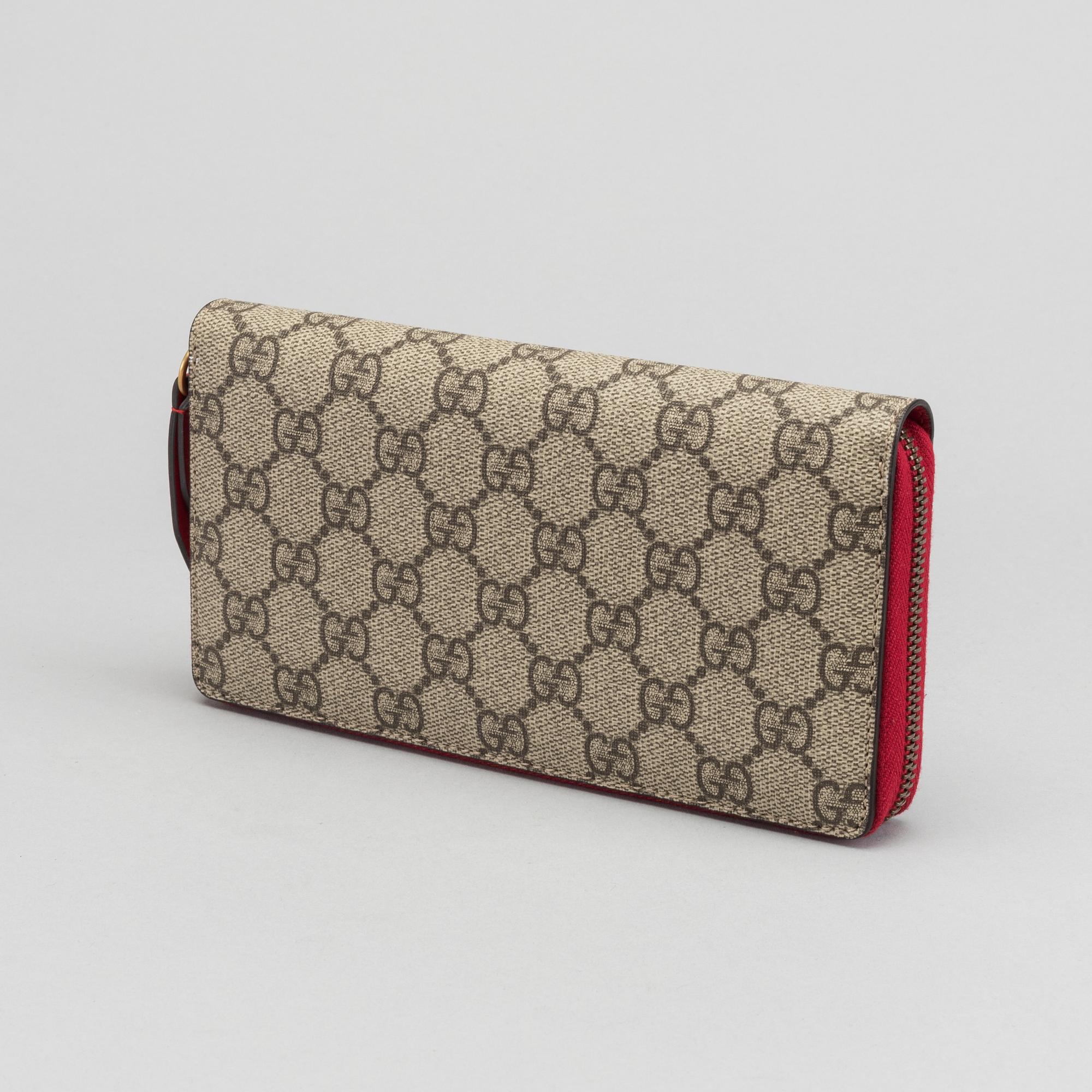 GUCCI plånbok.  "GG Supreme zip around wallet with cherries".