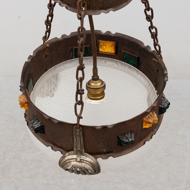 An Art Nouveau ceiling light, early 20th century.