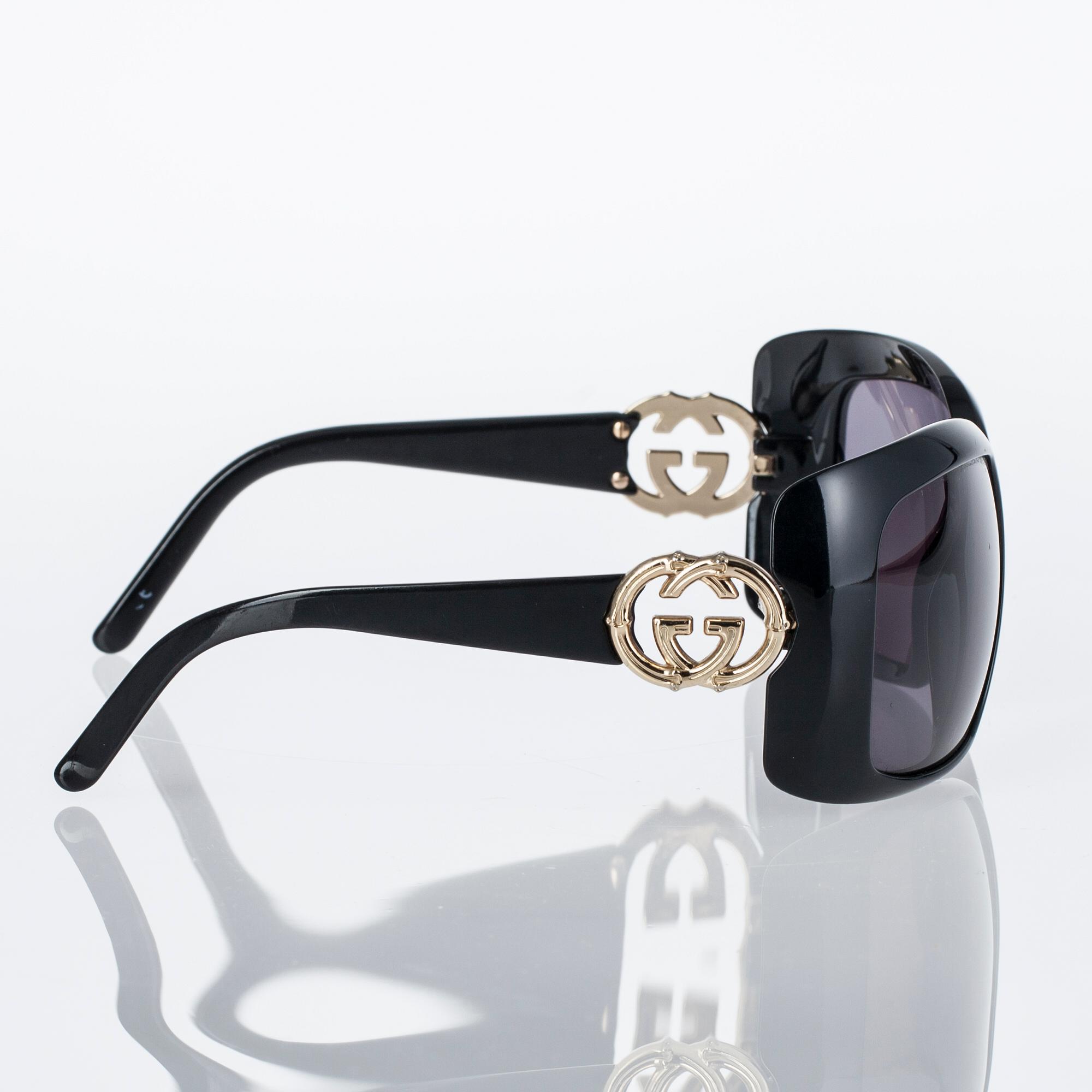 AURINKOLASIT, Gucci.