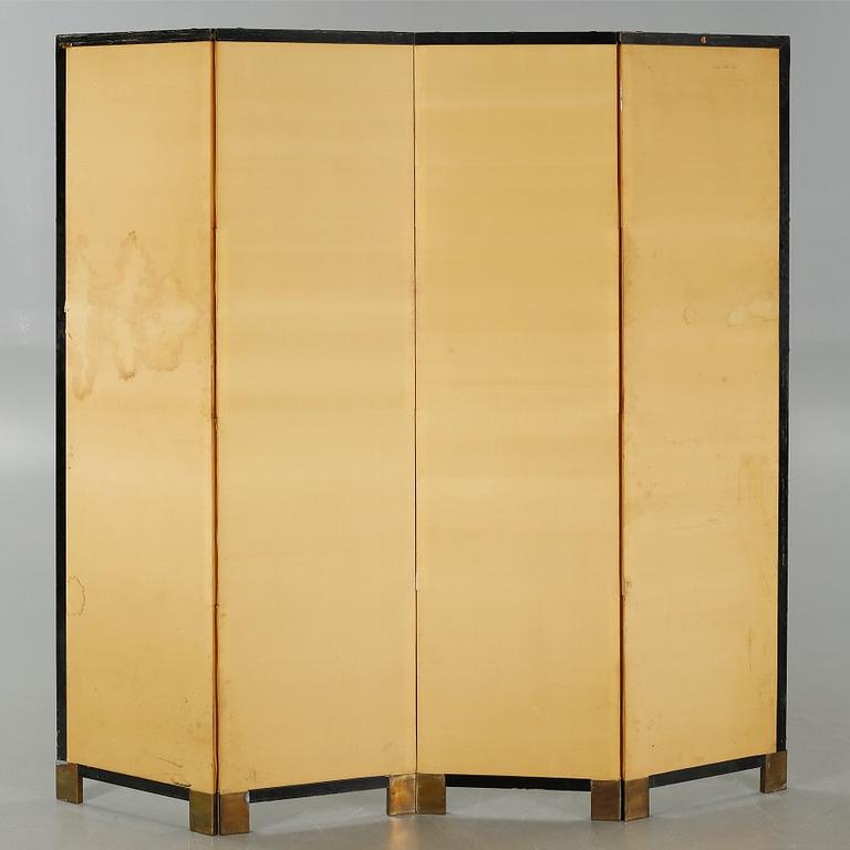 A 20th century folding screen.